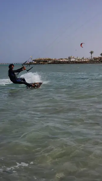 Instructor riding a kiteboard