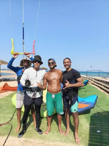 The Kite Fly team smiling on the grass
